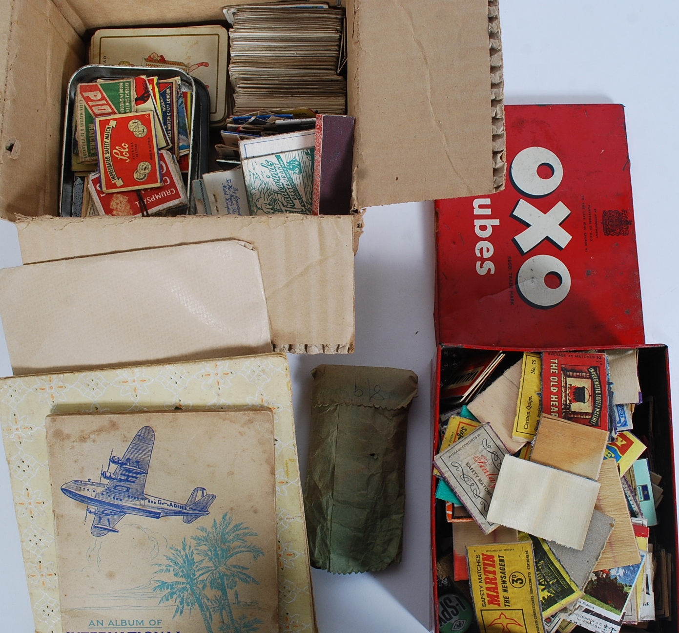 A good assorted mix of ephemera to include cigarette cards (loose and in albums), cards, coins,