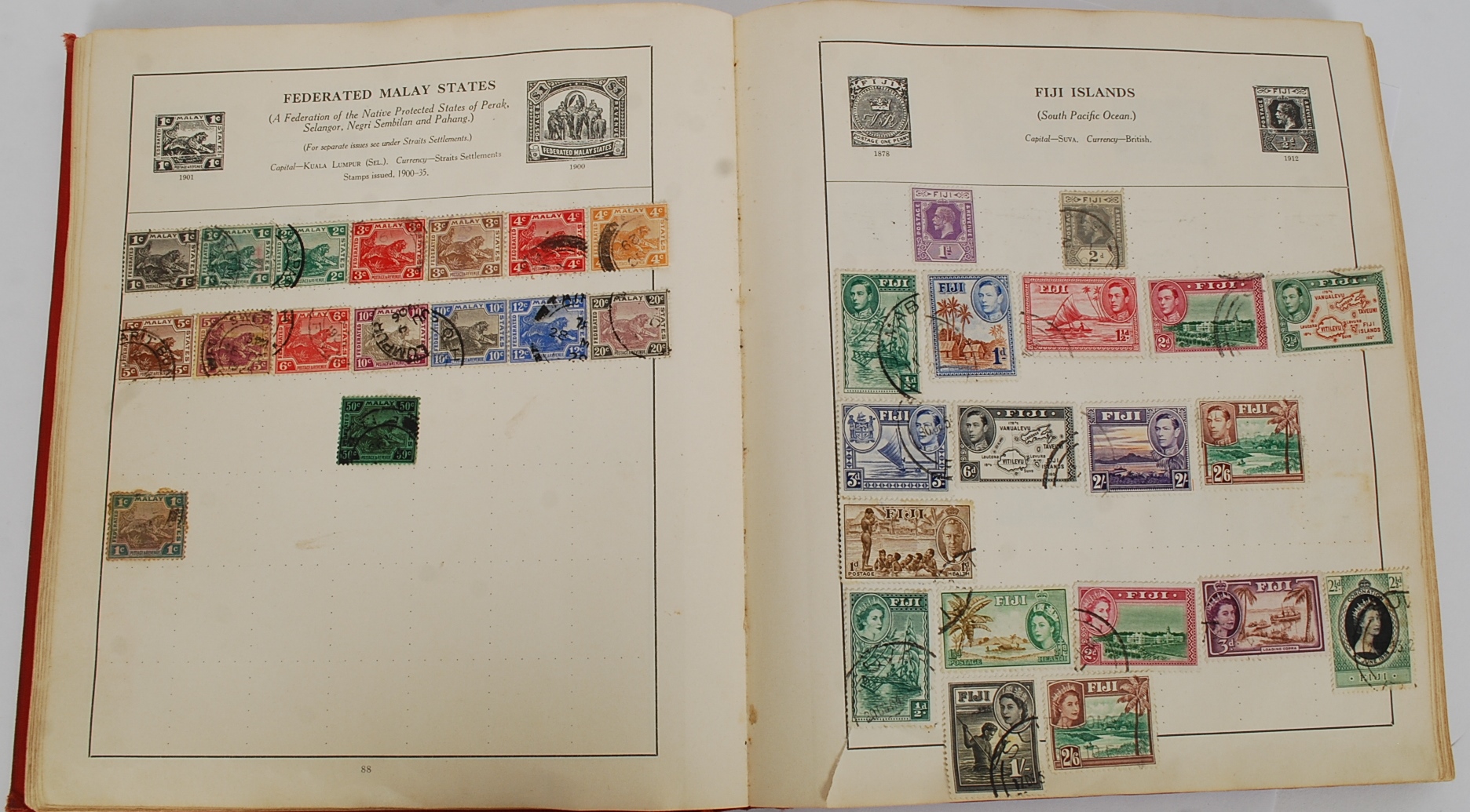 A good early 20th century stamp album consisting of world stamps along with British. - Image 2 of 4