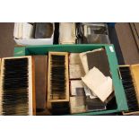 A large collection spanning three boxes of Victorian and early 20th century photographic glass
