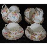 A set of 8x cups and saucers by Como, ' Made In England ' hand painting over transfer print.