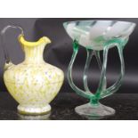 Two 20th century pieces of studio glass to include a twist supported vase and another.