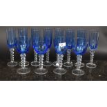 A selection of blue drinking glasses.