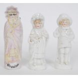 A collection of 19th century German figurines one entitled Grandma along with 2 others.