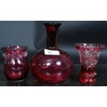 A collection of three pieces of 20th century cranberry glass / etched coloured glass to include