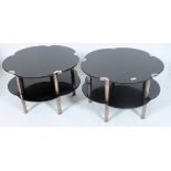 A pair of 1930's Art Deco black glass and chrome flower head shaped occasional coffee tables.