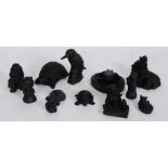 A collection of coal figurines