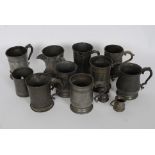 A collection of 19th century and possibly later pewter tankards to include Yates & Birch,