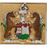 A large local interest 20th century plaster made plaque depicting the Bristol motto ' Virtue et