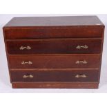 A 1940's post war gentlemans oak chest of drawers having a series of drawers to the chest with the