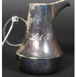 A 20th century c1970's Christopher Nigel Lawrence hallmarked silver small jug.