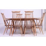 An Ercol elm and beech Windsor dining table, raised on square,