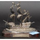 A hallmarked silver model of The Mary Rose.