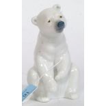 A Lladro figurine ' Sad Polar Bear Sat Down on Haunches ' Bearing  blue stamp to base.