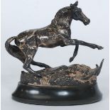 A cast silver model “Startled Yearling” by Geoffrey Snell,