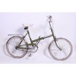 A vintage Raleigh 1980's folding ladies bicycle bike having good condition original green metallic