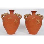 A pair of 20th century terracotta amphora vases,