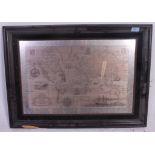 A framed Royal Geographical Society silver map of the world by John Pinches,