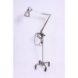 A large retro / vintage industrial floor standing machinists / draughtsman's angle poise lamp