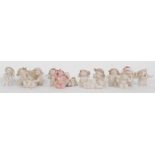 A collection Of Nao by Lladro cherub figurines to include Roly Poly, Shush Cherub, Giggles Cherub,