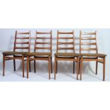 A set of 4 retro 1960's dining chairs having railed backs and upholstered seats.