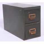 A  vintage 1950's industrial metal twin drawer office desk top filing cabinet in green,