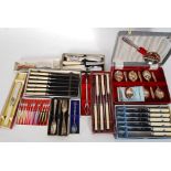 A selection of boxed flatware to include knife sets,