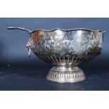 A good 20th century large silver plated heavily decorated punch bowl,