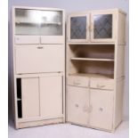 A retro upright 1950's kitchen dresser cabinet having fall front with drawers and cupboard together