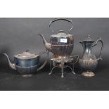 A collection of silver plated items to include a silver plated spirit burner,