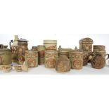 A good collection of Tremar studio pottery items to include kitchen canisters, jugs, pots,