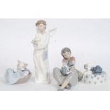 A collection of 4 Nao by Lladro figurines to include Boy With Angel No 1261,