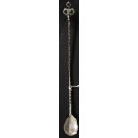 A 19th century Islamic unmarked silver - likely Turkish sherbert spoon with crescent and star