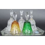 A group of five glass / crystal hand bells some coloured glass dating from the 20th century