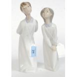 2 Lladro figurines ' Boy Blowing Kiss ' &  ' Girl Kissing 'Impressed factory marks 4869 & 4873