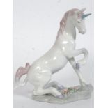 A Lladro Privilege porcelain figurine ' Magical Unicorn ' Model no 7697 impressed along with blue