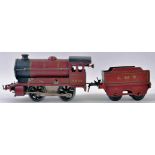 HORNBY; An original vintage Hornby 0 Gauge railway trainset clockwork locomotive and tender - 5600,