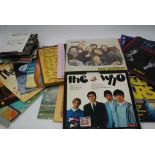 A collection of vinyl records from the 1980's and 1970's to include The Who, The Police, Other Pop,