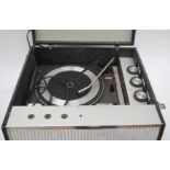 A vintage Bush portable record player together with a vintage Hacker Hunter portable radio and a