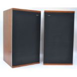 A stunning pair of teak cased DM2 speakers by B + W, Bowers and Wilkins,