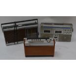 A collection of 3 vintage radios together with a retro tape player.