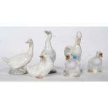 A collection of 6 Nao duck figurines. Al