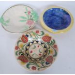 A collection of three pieces of ceramic