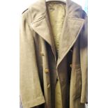 A 2nd World War American great coat having lined interior with clover army patch emblem to arm
