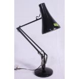 A vintage retro black Herbert Terry anglepoise adjustable lamp. Measures: 15cm diameter.