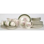 A vintage Bristol ( Poutney ) chintz pattern part dinner / tea service comprising cups, saucers,