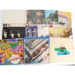 A collection of vinyl LP / Long Play records by The Beatles to include The White Album,