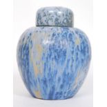 A Ruskin Pottery style drip glaze lustre  ginger jar and lid in blue and purples.
