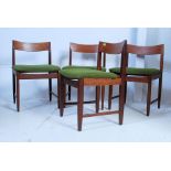 A set of 4 1970's Danish solid teak wood propeller back dining chairs.