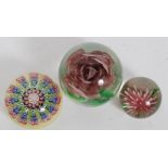 A 20th century Perthshire millefiori cane paperweight having inset P to centre together with 2