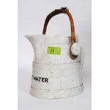 A George Jones designed hot water jug - stamped to the underside with the GJ Crescent.